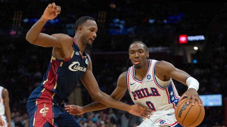 Cleveland Cavaliers' Evan Mobley, left, defends against Philadelphia 76ers' Tyrese Maxey (0) during the second half of an NBA basketball game . (Phil Long/AP)