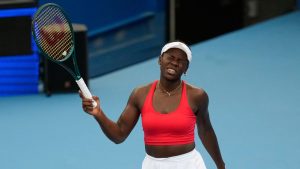 Victoria Mboko of Canada grimaces after missing a shot to Elise Mertens of Belgium during their women's singles match at the United Cup tennis tournament in Sydney, Tuesday, Jan. 6, 2026. (Rick Rycroft/AP Photo)