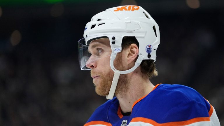 Edmonton Oilers centre Connor McDavid (97) waits for play to resume during the first period of an NHL hockey game against the Minnesota Wild, Saturday, Dec. 20, 2025, in St. Paul, Minn. (Abbie Parr/AP)