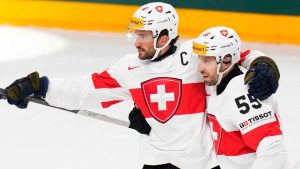 Czech Republic Ice Hockey Worlds
Switzerland's Roman Josi, left, celebrates with Switzerland's Romain Loeffel after scoring his sides second goal during the preliminary round match between Austria and Switzerland at the Ice Hockey World Championships. (Petr David Josek/AP)