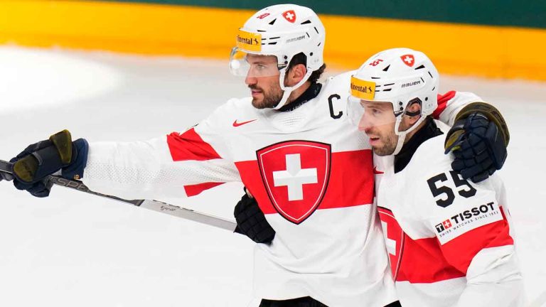 Czech Republic Ice Hockey Worlds
Switzerland's Roman Josi, left, celebrates with Switzerland's Romain Loeffel after scoring his sides second goal during the preliminary round match between Austria and Switzerland at the Ice Hockey World Championships. (Petr David Josek/AP)