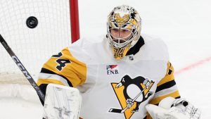 Pittsburgh Penguins goaltender Stuart Skinner deflects the puck during the second period of an NHL hockey game against the Boston Bruins, Sunday, Jan. 11, 2026, in Boston. (Mark Stockwell/AP)