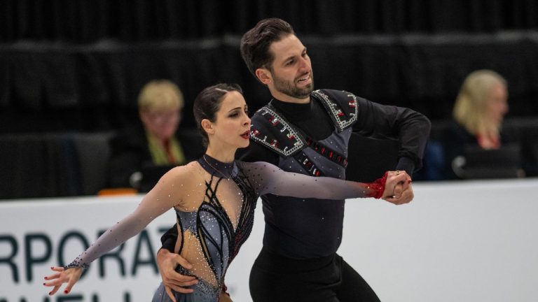 Deanna Stellato-Dudek and Maxime Deschamps of Canada skate in the Pairs Short Program in the 2025 Skate Canada International event in Saskatoon, on Friday, October 31, 2025. (Matt Smith/THE CANADIAN PRESS)