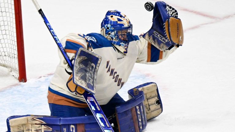 Vancouver Goldeneyes goalie Emerance Maschmeyer juggles with a puck during first period Colorado Avalanche action against the Montreal Victoire at the Videotron Centre in Quebec City, Sunday, January 11, 2026. (Jacques Boissinot/THE CANADIAN PRESS)