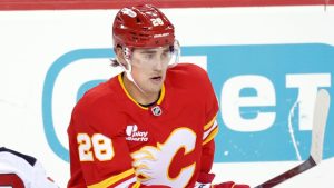 Defenceman Zach Whitecloud plays his first game for the Calgary Flames after being traded from the Vegas Golden Knights as part of the Rasmus Andersson trade deal in Calgary, Alta., Monday, Jan. 19, 2026. (Larry MacDougal/THE CANADIAN PRESS)