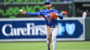 Toronto Blue Jays second baseman Andrés Giménez throws to first base for an out on a ball hit by Baltimore Orioles' Ryan O'Hearn during the fifth inning of a baseball game in Baltimore, Sunday, April 13, 2025. (AP/Terrance Williams)