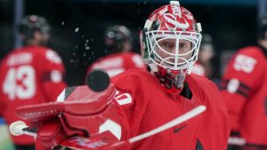Canada goalie Jordan Binnington (50) warms up ahead of a quarterfinal men's hockey game against Czechia at the 2026 Winter Olympics, in Milan, on Wednesday, Feb. 18, 2026. (Darryl Dyck/CP)