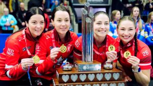 Team Canada, from left to right, skip Kerri Einarson, third Val Sweeting, second Shannon Birchard and lead Karlee Burgess celebrate after they won the Scotties Tournament of Hearts curling finals in Mississauga, Ont., Sunday, Feb. 1, 2026. (THE CANADIAN PRESS/Frank Gunn)