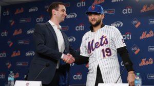 Bo Bichette, right, shakes hands with David Stearns, President of Baseball Operations for the New York Mets, during his introductory press conference, Wednesday, Jan. 21, 2026, in New York. (Heather Khalifa/AP)