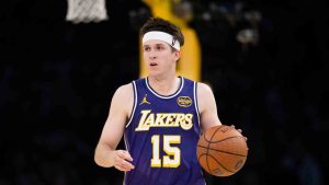 Los Angeles Lakers guard Austin Reaves (15) dribbles during the second half of an NBA Cup basketball game against the Dallas Mavericks in Los Angeles, Friday, Nov. 28, 2025. (Kyusung Gong/AP)