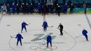 France men's ice hockey players take part in a training session ahead of the 2026 Winter Olympics in Milan, Italy, Tuesday, Feb. 3, 2026. (AP Photo/Hassan Ammar)