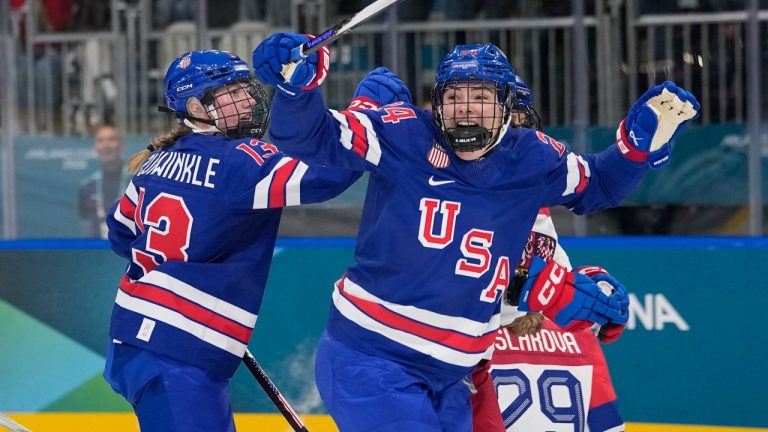 United States' Joy Dunne, right, celebrates after scoring her sides second goal during a preliminary round match of women's ice hockey between United States and Czechia at the 2026 Winter Olympics, in Milan, Italy, Thursday, Feb. 5, 2026. (AP Photo/Petr David Josek)