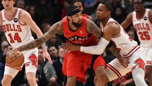 Toronto Raptors' Brandon Ingram (3) protects the ball from Chicago Bulls' Isaac Okoro (35) during first half NBA basketball game action in Toronto on Thursday, Feb. 5, 2026. (Jon Blacker/CP)