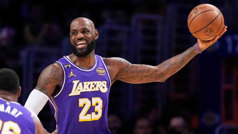 Los Angeles Lakers forward LeBron James smiles as he tries to pass during the first half of an NBA basketball game against the Dallas Mavericks, Thursday, Feb. 12, 2026, in Los Angeles. (Mark J. Terrill/AP)