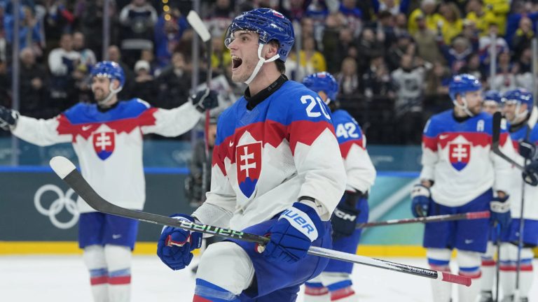Slovakia's Juraj Slafkovsky celebrates end of a preliminary round match of men's ice hockey between Sweden and Slovakia at the 2026 Winter Olympics, in Milan, Italy, Saturday, Feb. 14, 2026. (Petr David Josek/AP)