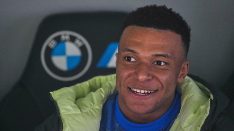 Real Madrid's Kylian Mbappe sits on the bench prior to the Spanish La Liga soccer match between Real Madrid and Real Sociedad in Madrid, Spain, Saturday, Feb. 14, 2026. (AP Photo/Manu Fernandez)