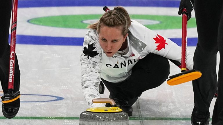 Canada's Sarah Wilkes, Rachel Homan and Emma Miskew in action during the women's curling round robin session against South Korea at the 2026 Winter Olympics, in Cortina d'Ampezzo, Italy, Monday, Feb. 16, 2026. (AP Photo/Fatima Shbair)