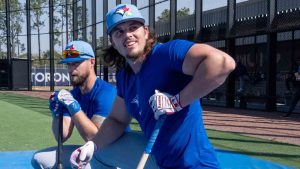 Toronto Blue Jays Addison Barger (right) and Nathan Lukes keep an eye on the action during batting practice at Spring Training in Dunedin, Fla. on Friday February 20, 2026. (Frank Gunn/CP)