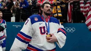United States' Connor Hellebuyck (37) celebrates after the United States defeated Canada in a men's ice hockey gold medal game between Canada and the United States at the 2026 Winter Olympics, in Milan, Italy, Sunday, Feb. 22, 2026. (Petr David Josek/AP)
