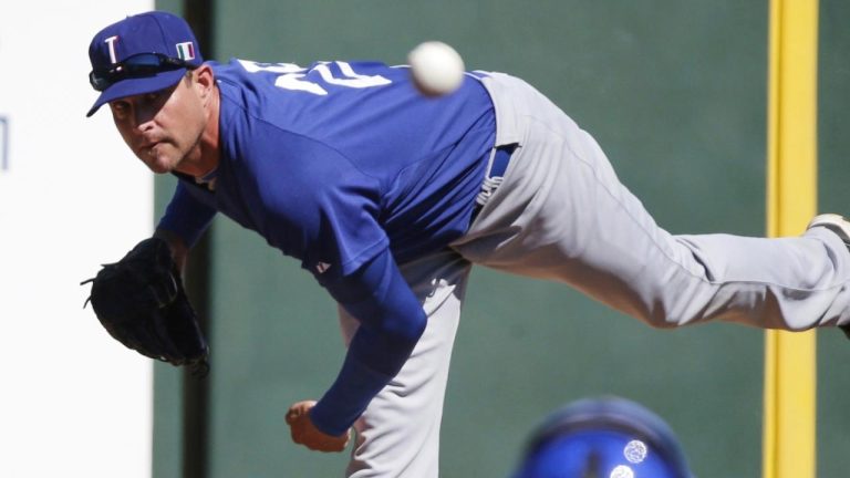 Italy's Dan Serafini throws before the first inning of an exhibition spring training baseball game against the Los Angeles Angels Wednesday, March 6, 2013, in Tempe, Ariz. (Morry Gash/AP)