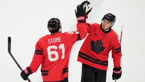 Canada's Mark Stone (61) celebrates after scoring a goal during a preliminary round game of men's ice hockey between Canada and France at the 2026 Winter Olympics, in Milan, Italy, Sunday, Feb. 15, 2026. (Hassan Ammar/AP)