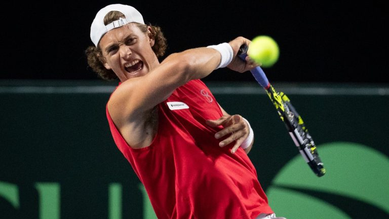Canada's Liam Draxl returns to Brazil's Gustavo Heide during the first set of a Davis Cup Qualifiers tennis singles match in Vancouver, on Saturday, Feb. 7, 2026. THE CANADIAN PRESS/Ethan Cairns