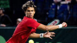 Canada's Gabriel Diallo returns to Brazil's Matheus Pucinelli de Almeida during the second set of a Davis Cup Qualifiers tennis singles match in Vancouver, on Saturday, Feb. 7, 2026. (Ethan Cairns/CP)