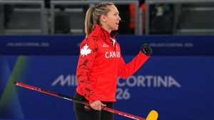 Canada's Rachel Homan in action during the women's curling round robin session against Italy at the 2026 Winter Olympics, in Cortina d'Ampezzo, Italy, Wednesday, Feb. 18, 2026. (Fatima Shbair/AP)