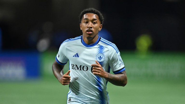 CF Montréal defender Jahkeele Marshall-Rutty (11) works during the first half of an MLS soccer match against Atlanta United, Saturday, Feb. 22, 2025, in Atlanta. (Danny Karnik/AP)