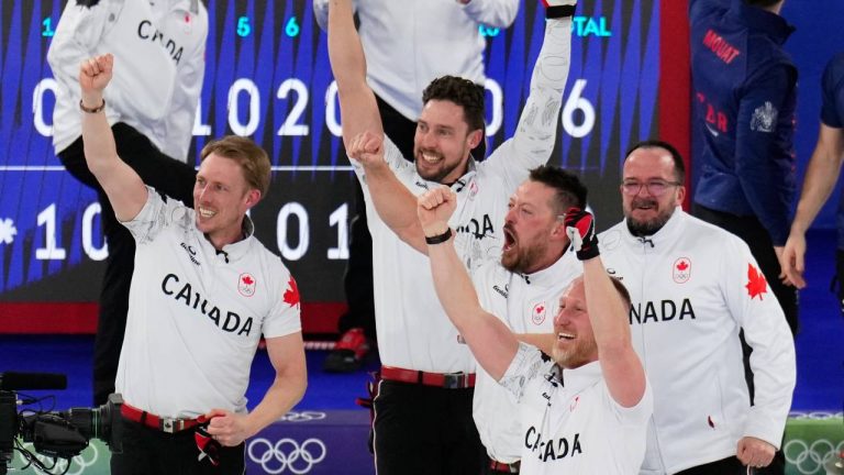 Canada's Brett Gallant, Brad Jacobs, Marc Kennedy and Ben Hebert celebrate defeating Britain in a men's curling gold medal match, at the 2026 Winter Olympics, in Cortina d'Ampezzo, Italy, Saturday, Feb. 21, 2026. (Fatima Shbair/AP)
