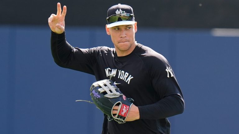 New York Yankees right fielder Aaron Judge waves to fans during a spring training baseball workout on Thursday, Feb. 12, 2026, in Tampa, Fla. (Chris O'Meara/AP)