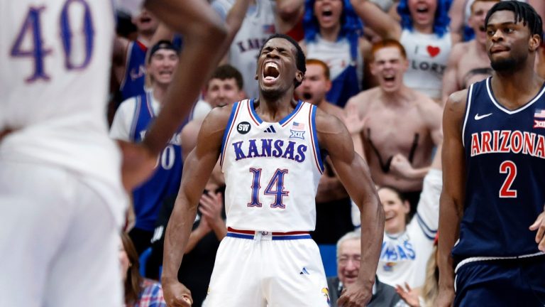 Kansas guard Melvin Council Jr. (14) reacts after scoring during the second half of an NCAA college basketball game against Arizona, Monday, Feb. 9, 2026, in Lawrence, Kan. (Colin E. Braley/AP)