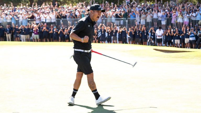 Anthony Kim of 4Aces GC reacts to his putt on the 18th green during the final round of the LIV Golf Adelaide at Grange Golf Club in Adelaide, Australia Sunday, Feb. 15, 2026. (Charles Laberge/LIV Golf via AP)
