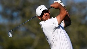 Brooks Koepka tees off on the eighth hole while playing the North Course at Torrey Pines during the second round of the Farmers Insurance Open golf tournament Friday, Jan. 30, 2026, in San Diego. (AP/Denis Poroy)