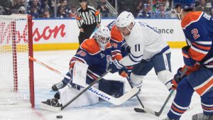 Toronto Maple Leafs' Max Domi (11) is stopped by Edmonton Oilers' goalie Connor Ingram (39) during first period NHL action, in Edmonton on Tuesday, Feb. 3, 2026. (Jason Franson/CP)