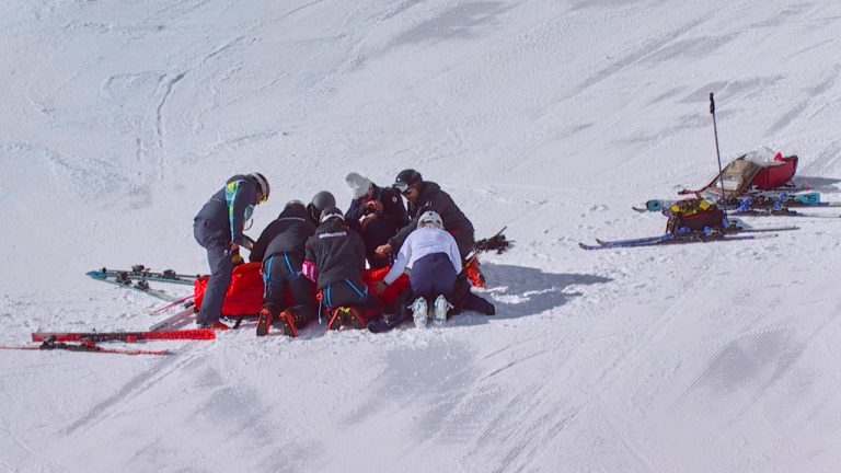 In this image taken from video provided by Olympic Broadcasting Services, OBS, United States' Lindsey Vonn is prepared for evacuation after crashing during an alpine ski women's downhill race, at the 2026 Winter Olympics, in Cortina d'Ampezzo, Italy, Sunday, Feb. 8, 2026. (Olympic Broadcasting Services via AP)