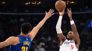 Los Angeles Clippers guard Bennedict Mathurin (9) shoots over Denver Nuggets forward Spencer Jones (21) during the first half of an NBA basketball game Thursday, Feb. 19, 2026, in Inglewood, Calif. (Kyusung Gong/AP)