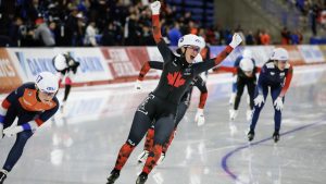 Canada's Ivanie Blondin celebrates winning the women's mass start competition at the ISU World Cup speed skating event in Calgary on Nov. 23, 2025. (Photo by Jeff McIntosh/CP)
