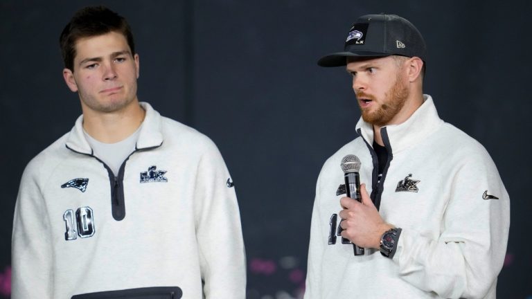 New England Patriots quarterback Drake Maye, left, and Seattle Seahawks quarterback Sam Darnold speak during the NFL Super Bowl Opening Night, Monday, Feb. 2, 2026, in San Jose, Calif. ahead of the Super Bowl 60 football game between the New England Patriots and the Seattle Seahawks. (Godofredo A. Vásquez/AP)