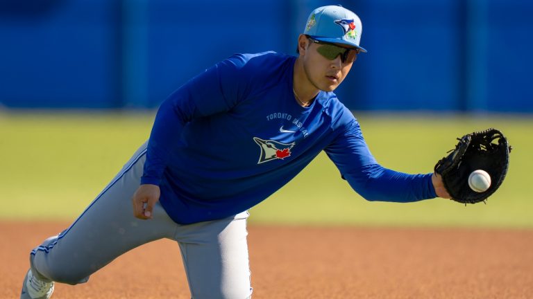 Toronto Blue Jays' Kazuma Okamoto fields a ground ball at Spring Training in Dunedin, Fla., on Thursday, Feb. 19, 2026. (THE CANADIAN PRESS/Frank Gunn)