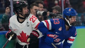 United States' Hannah Bilka (23) challenges with Canada's Marie-Philip Poulin (29) during a women's ice hockey gold medal game between the United States and Canada at the 2026 Winter Olympics, in Milan, Italy, Thursday, Feb. 19, 2026. (Hassan Ammar/AP)