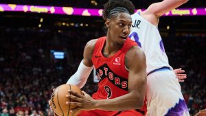 Toronto Raptors' RJ Barrett drives past Utah Jazz's Walter Clayton Jr. during second half NBA action in Toronto, on Sunday, Feb. 1, 2026. (THE CANADIAN PRESS/Sammy Kogan)