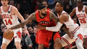 Toronto Raptors' Brandon Ingram (3) protects the ball from Chicago Bulls' Isaac Okoro (35) during first half NBA basketball game action in Toronto on Thursday, Feb. 5, 2026. (Jon Blacker/CP)