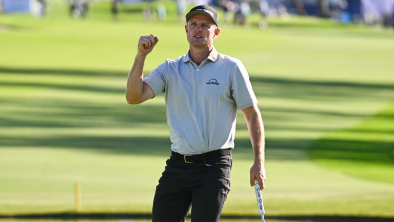 Justin Rose, of England, celebrates on the 18th green after winning the Farmers Insurance Open golf tournament Sunday, Feb. 1, 2026, at Torrey Pines in San Diego. (AP/Denis Poroy)