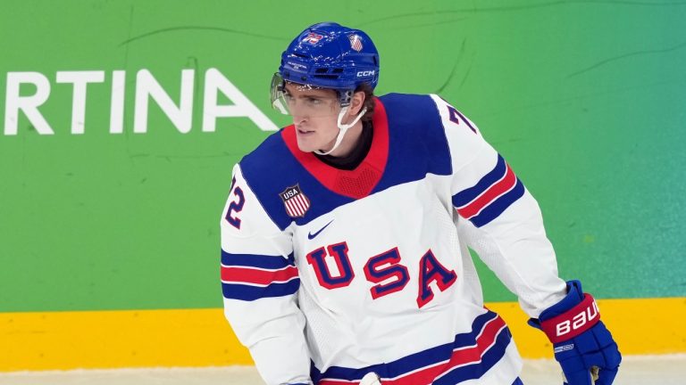 United States' Tage Thompson skates past the bench after scoring a goal against Slovakia during the first period of a men's ice hockey semifinal game at the 2026 Winter Olympics in Milan, Italy, Friday, Feb. 20, 2026. (AP/Carolyn Kaster)