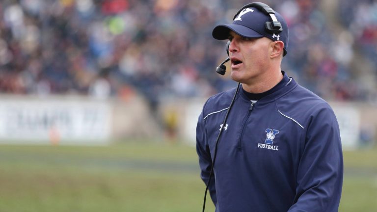 Yale coach Tony Reno watches from the sidelines against Harvard during an NCAA college football game on Saturday, Nov. 18, 2017 in New Haven, Conn. (Gregory Payan/AP)
