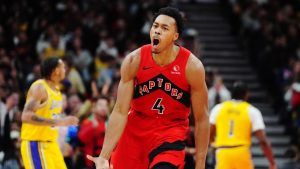 Toronto Raptors' Scottie Barnes (4) celebrates a basket against the Los Angeles Lakers during second half NBA basketball action in Toronto on Thursday, Dec. 4, 2025. (Frank Gunn/CP)