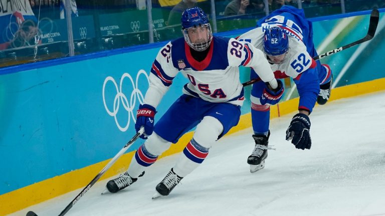 United States' Brock Nelson (29) challenges for the puck with Slovakia's Martin Marincin (52) during a men's ice hockey semifinal game between United States and Slovakia at the 2026 Winter Olympics, in Milan, Italy, Friday, Feb. 20, 2026. (Petr David Josek/AP)