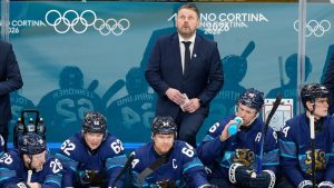 Finland's head coach Antti Pennanen looks up during a preliminary round match of men's ice hockey between Finland and Sweden at the 2026 Winter Olympics, in Milan, Italy, Friday, Feb. 13, 2026. (AP Photo/Hassan Ammar)