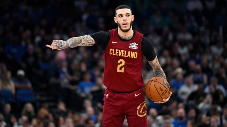 Cleveland Cavaliers guard Lonzo Ball (2) controls the ball up the court during the second half of an NBA basketball game against the Orlando Magic, Saturday, Jan. 24, 2026, in Orlando, Fla. (AP Photo/Phelan M. Ebenhack)